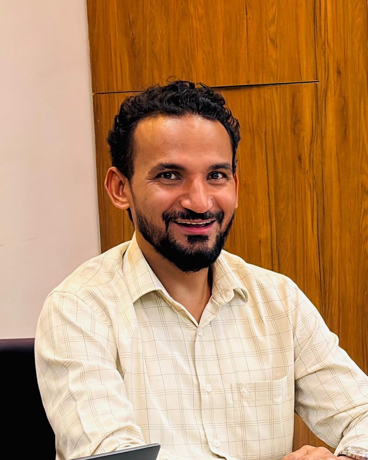 Asif Ali at his desk in Uttam Nagar, New Delhi