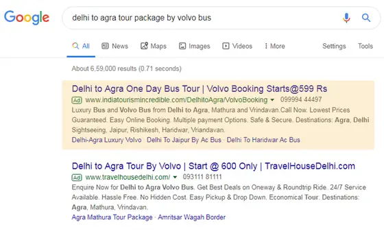 Google search results showing a top-position ad for Delhi to Agra Volvo bus tour packages
